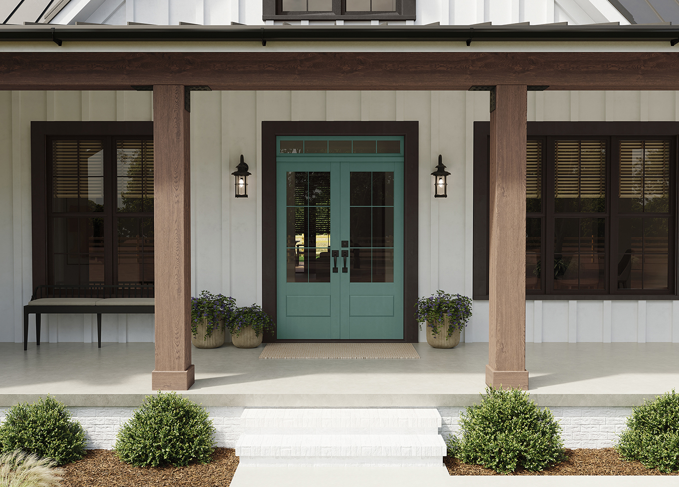 Renew Blue door with light fixtures centered on porch. Home has wood columns, vertical siding and shuttered windows.