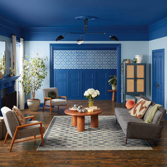 Six-image carousel of living room, child’s room, entryway, backyard and kitchen, all incorporating Renew Blue.